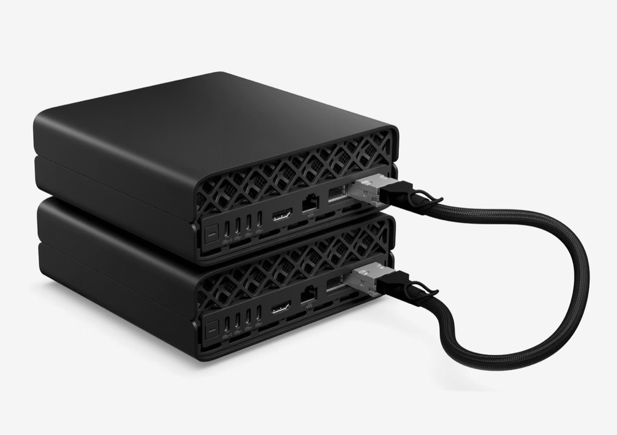 Two HP ZGX Nano AI stations connected for a dual-node workload.